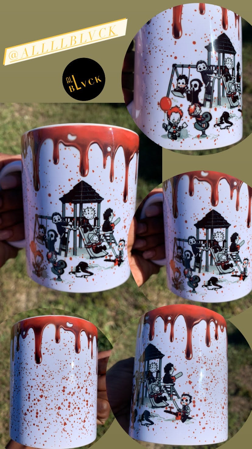 This white ceramic mug comes blood stained with our favorite Halloween villains on the playground.   Material: White ceramic mug  Dimensions: 11 and 15 oz.  Care Instructions: Mug dishwasher and microwave safe.  