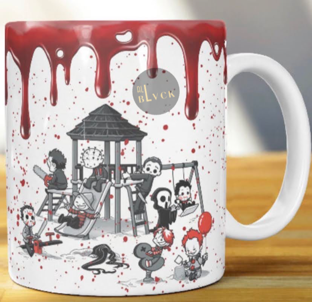 This white ceramic mug comes blood stained with our favorite Halloween villains on the playground.   Material: White ceramic mug  Dimensions: 11 and 15 oz.  Care Instructions: Mug dishwasher and microwave safe.  